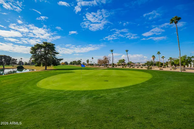 a view of yard with outdoor seating and green space