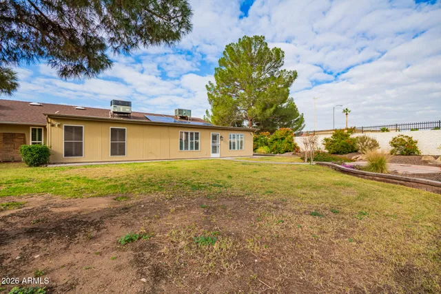 a view of an ocean with residential houses