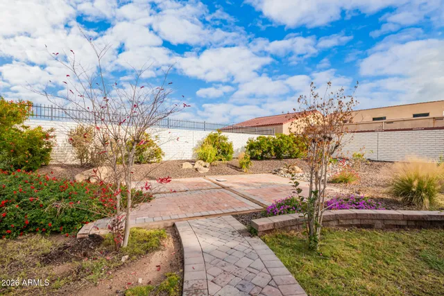 a view of swimming pool with a yard