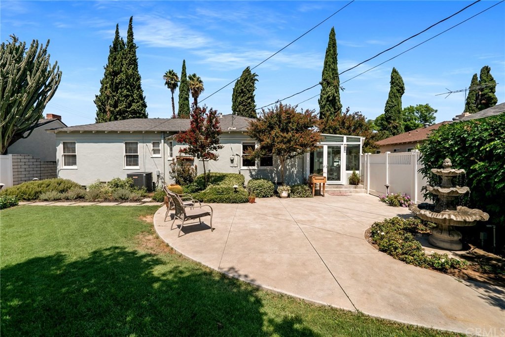 4682 Sunnyside Drive Riverside, CA 92506 - Photo 30 of 35 Alternate view of the landscaped back yard and patio area, as well as the entrance to the Four Season sun room.