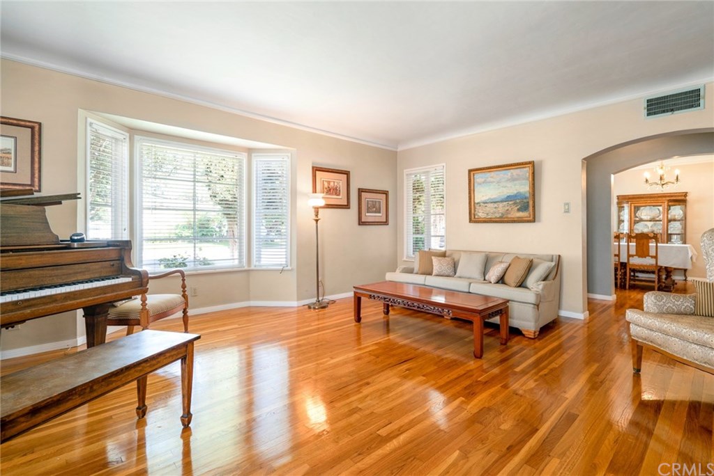 Alternate view of large living room into the formal dining room.