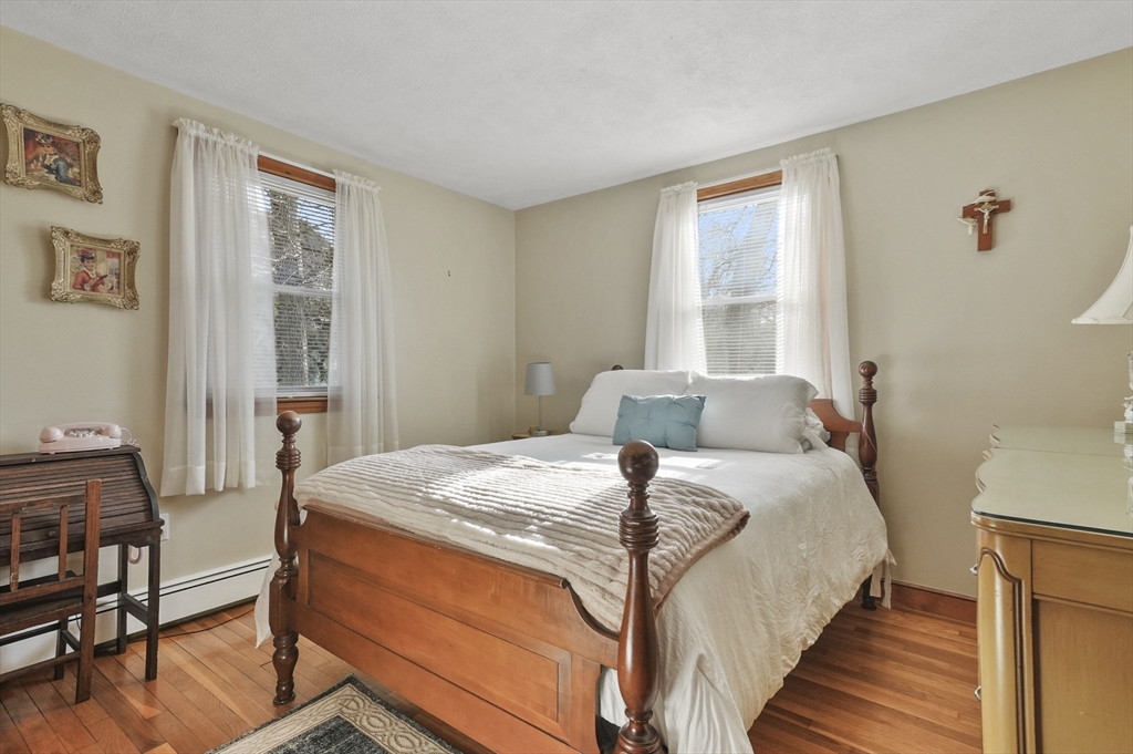 95 Gregory Street Waltham, MA 02451 - Photo 21 of 36 a bedroom with a bed and a window