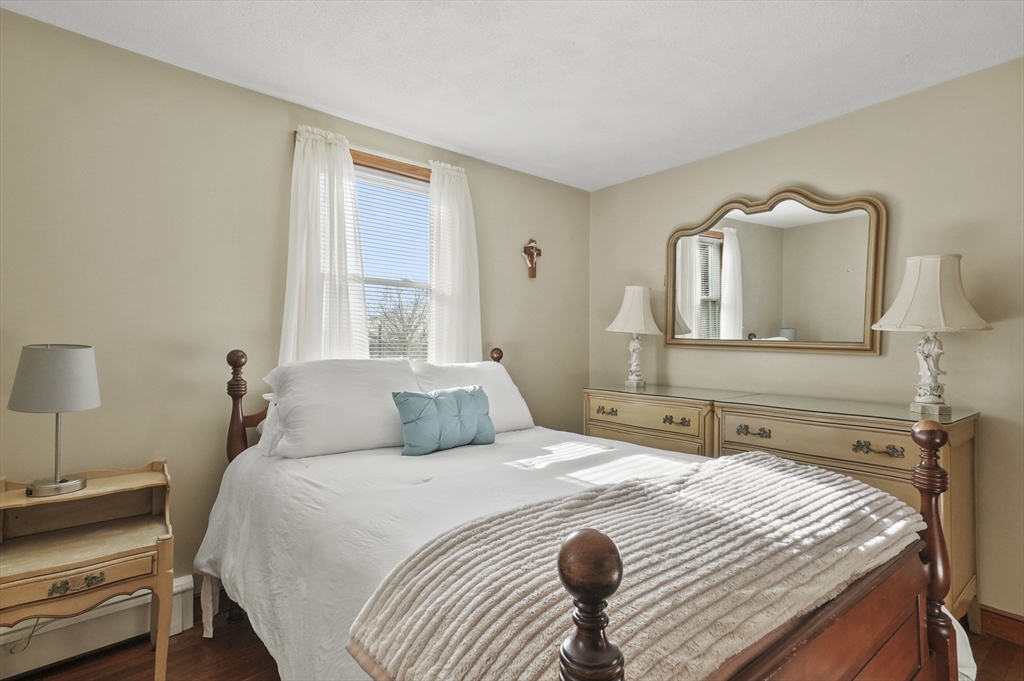 95 Gregory Street Waltham, MA 02451 - Photo 22 of 36 a bedroom with a bed and a window
