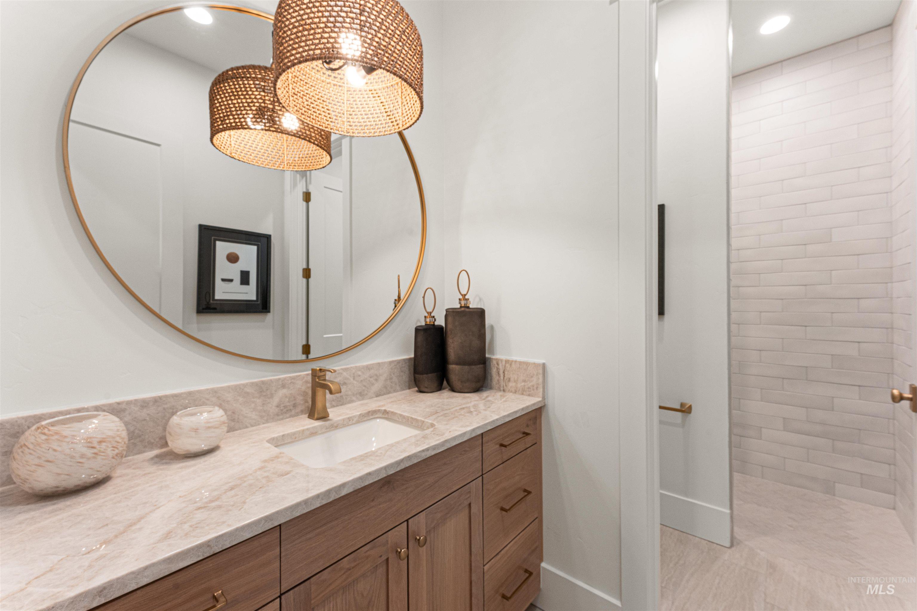 6400 North High Vly Way Eagle, ID 83714 - Photo 15 of 49 Bathroom with vanity, recessed lighting, and tiled shower