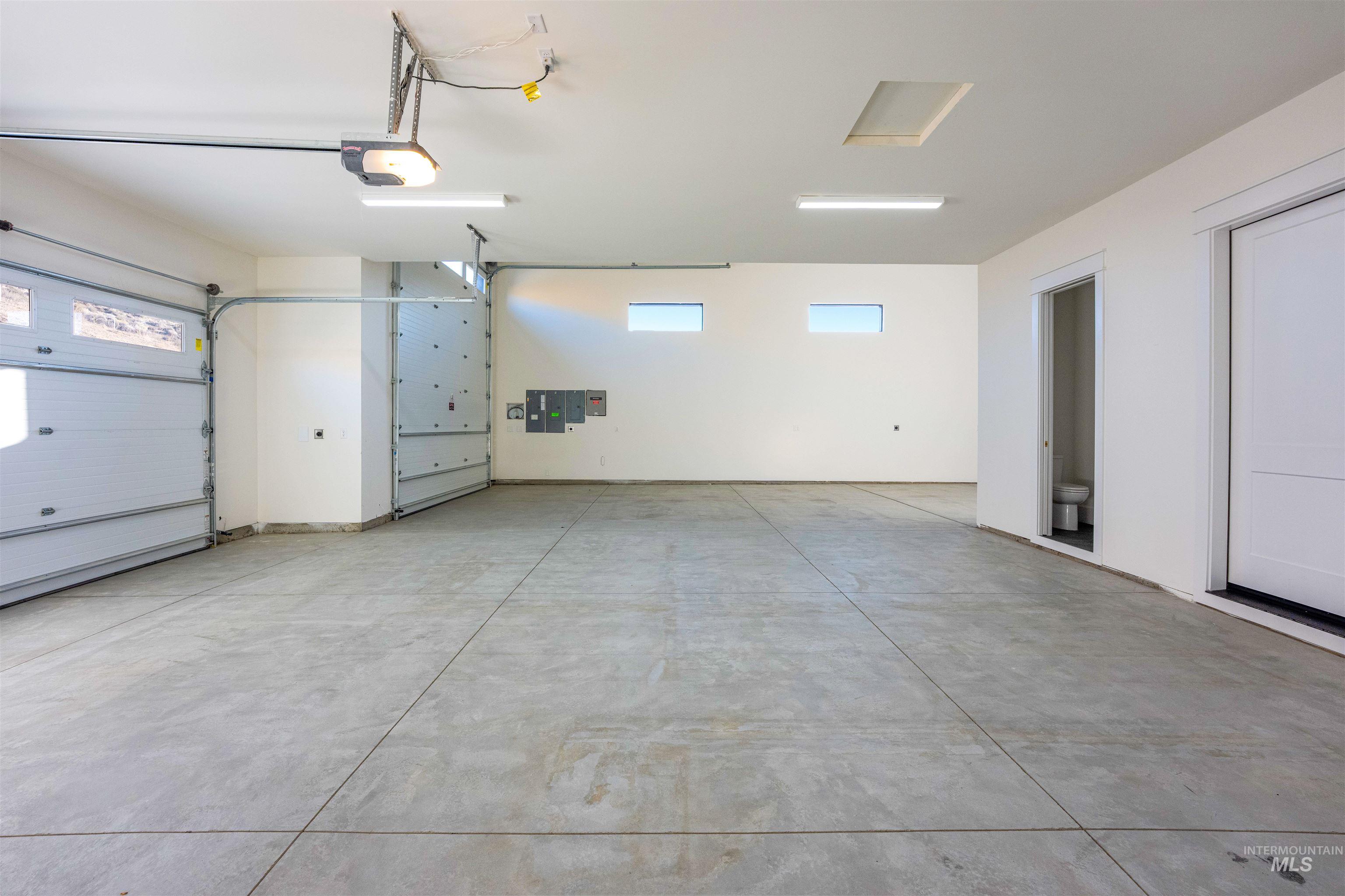 6400 North High Vly Way Eagle, ID 83714 - Photo 38 of 49 Garage with a garage door opener