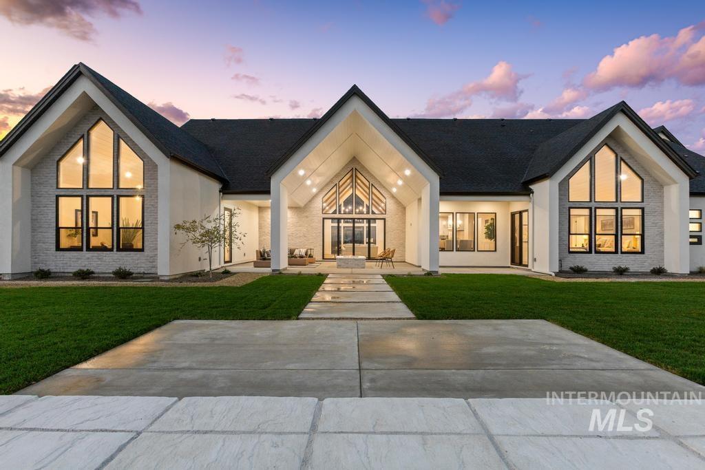 6400 North High Vly Way Eagle, ID 83714 - Photo 42 of 49 View of front of property featuring a front lawn and a patio