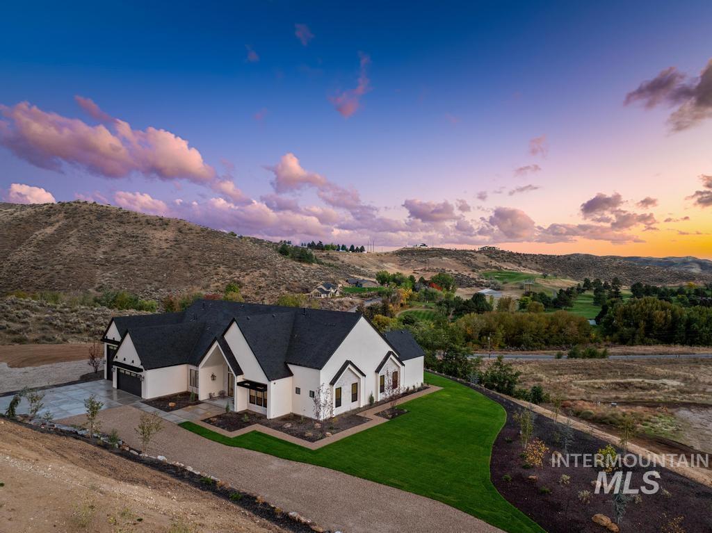 6400 North High Vly Way Eagle, ID 83714 - Photo 47 of 49 Aerial view at dusk