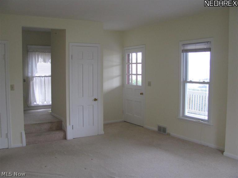 6512 Som Center Road Solon, OH 44139 - Photo 4 of 17 A spacious living room with three windows to let in plenty of sunshine! Windows updated in 2003!