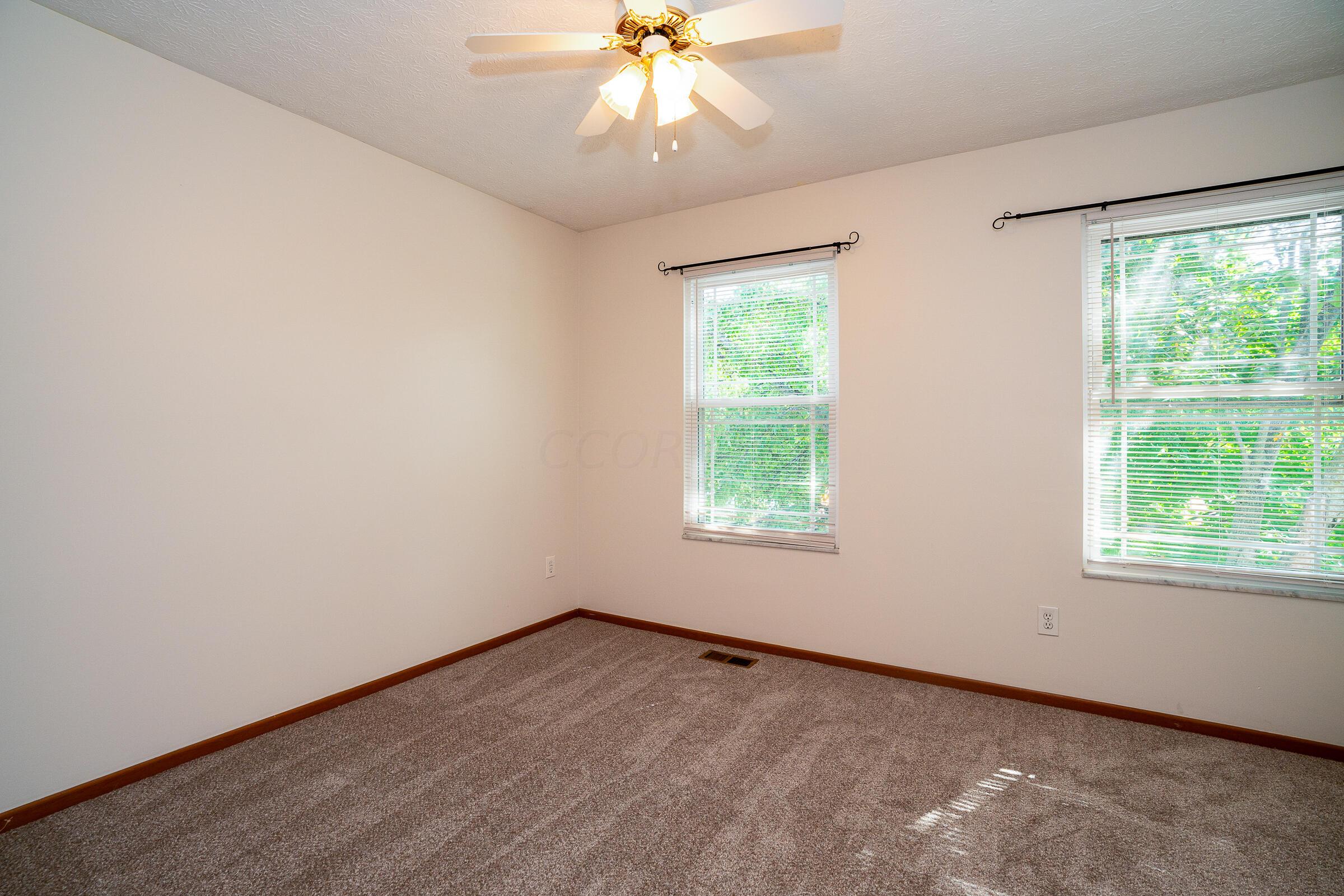 2135 Tonda Lane Grove City, OH 43123 - Photo 21 of 37 Bedroom #2 features new carpeting and is freshly painted