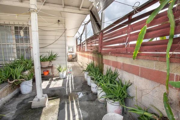 a backyard of a house with seating space