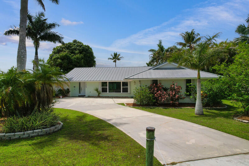 1209 Southwest Dyer Point Road Palm City, FL 34990 - Photo 3 of 56 front1.jpg-vsuniqueid-69e28a43d9297