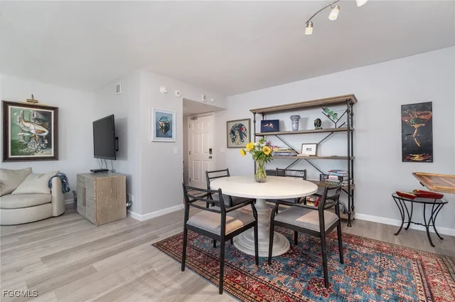 a view of a dining room with furniture