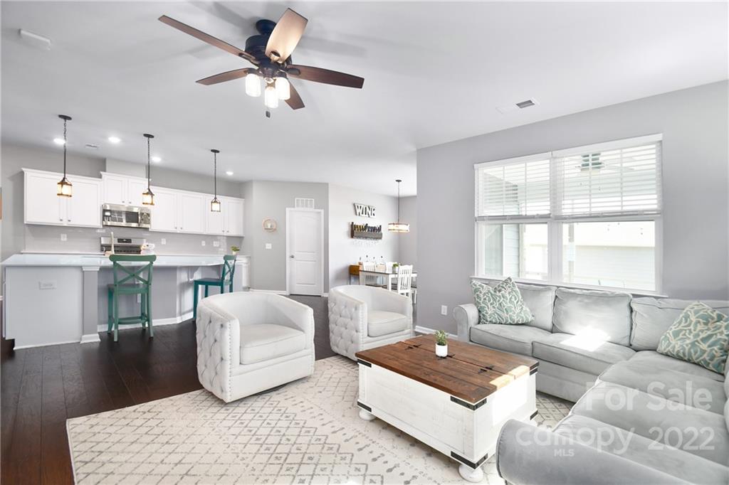 17239 Shearer Road Davidson, NC 28036 - Photo 14 of 32 a living room with furniture and a large window