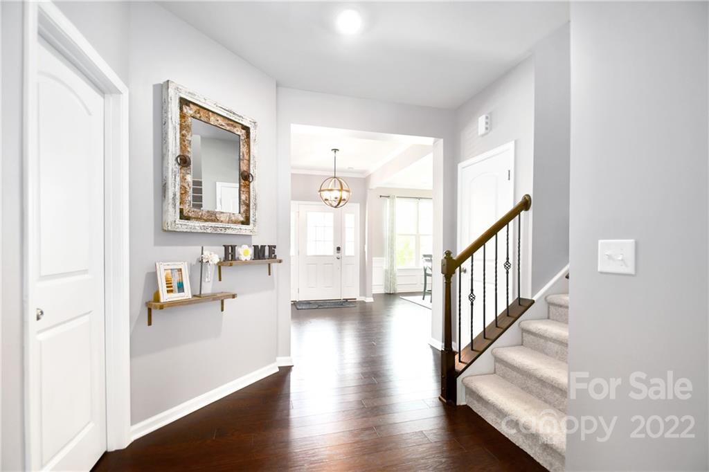 17239 Shearer Road Davidson, NC 28036 - Photo 6 of 32 a view of an entryway with wooden floor