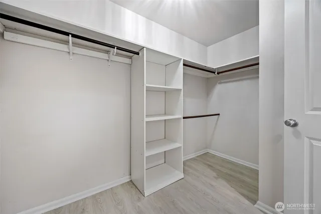a view of an empty walk in closet