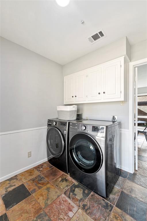 7116 Hunters Ridge Drive Dallas, TX 75248 - Photo 25 of 33 a view of a storage & utility room with washer and dryer