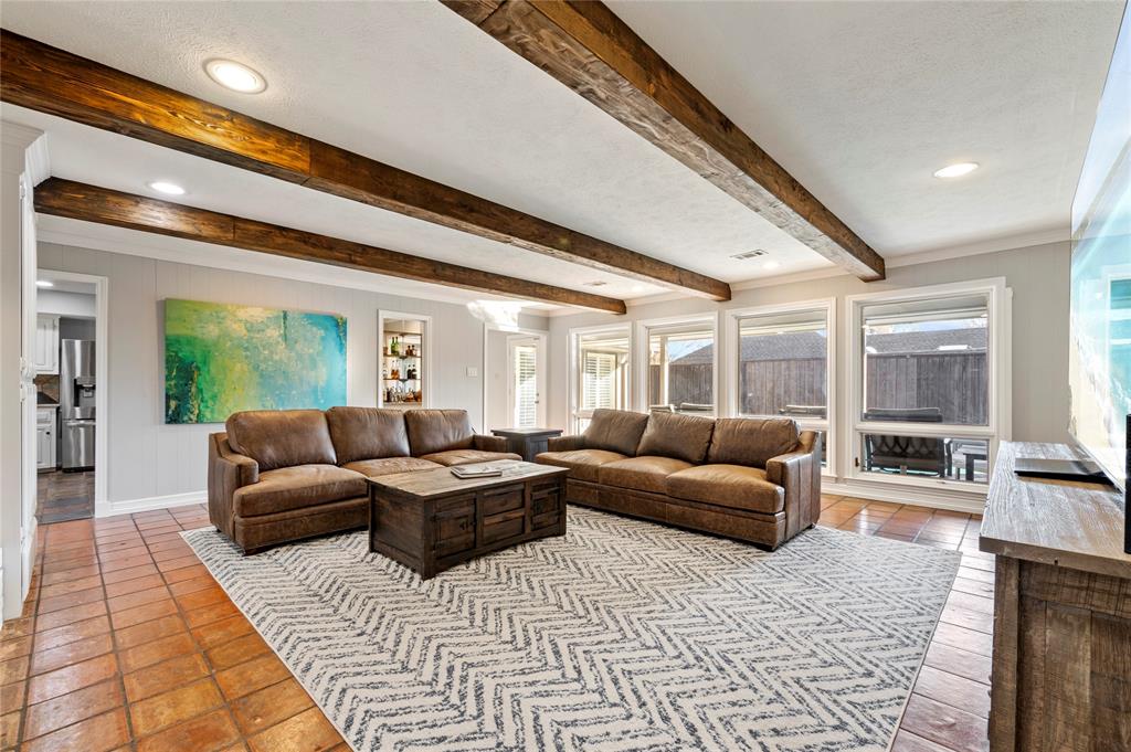 7116 Hunters Ridge Drive Dallas, TX 75248 - Photo 3 of 33 a living room with furniture and a large window