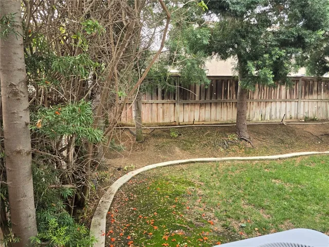 a view of a porch with a garden