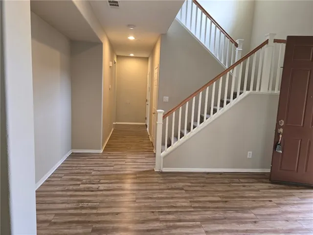 a view of a bathroom from the hallway