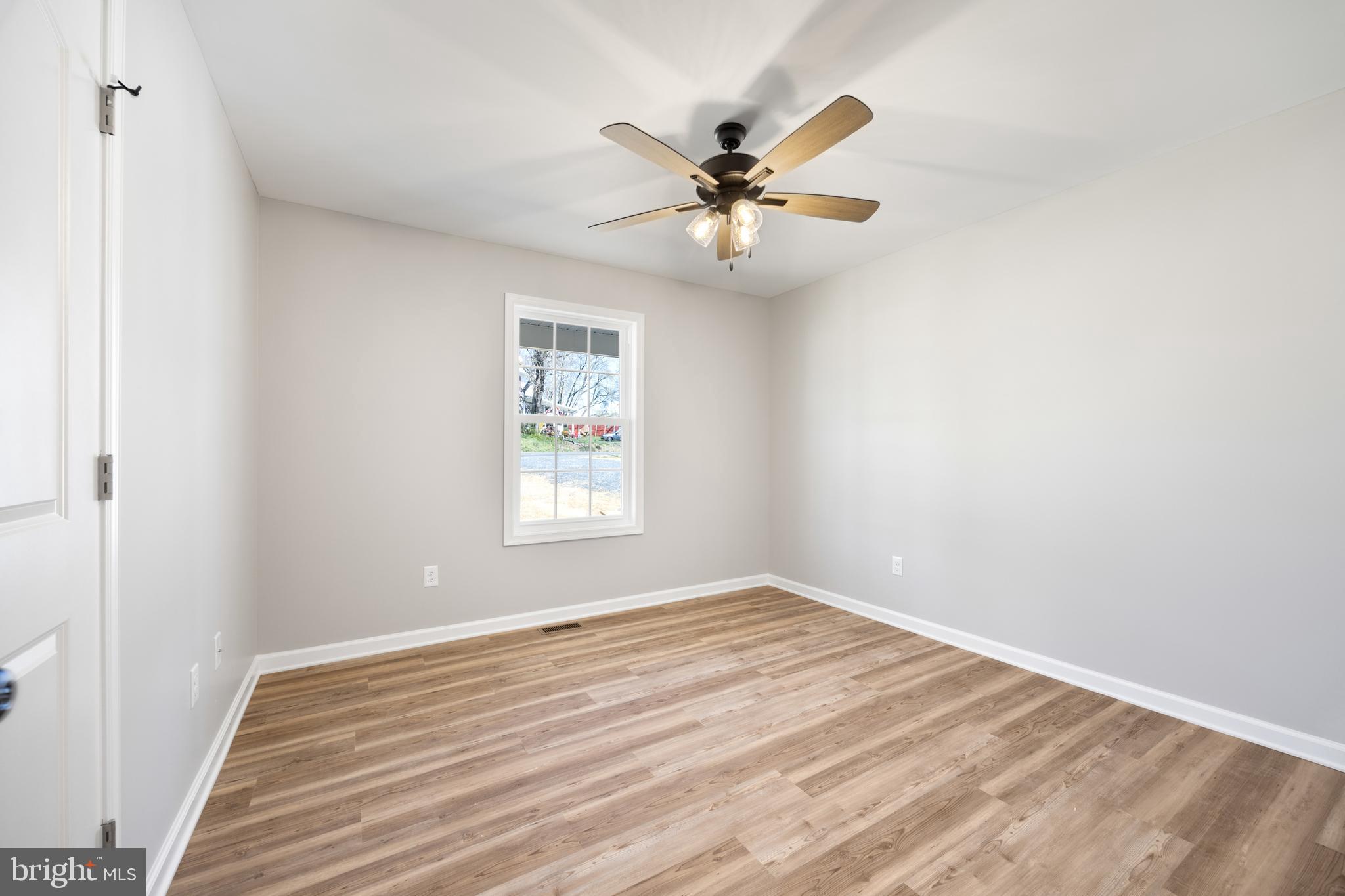 13518 Senedo Road Mount Jackson, VA 22842 - Photo 15 of 22 a view of an empty room with a window
