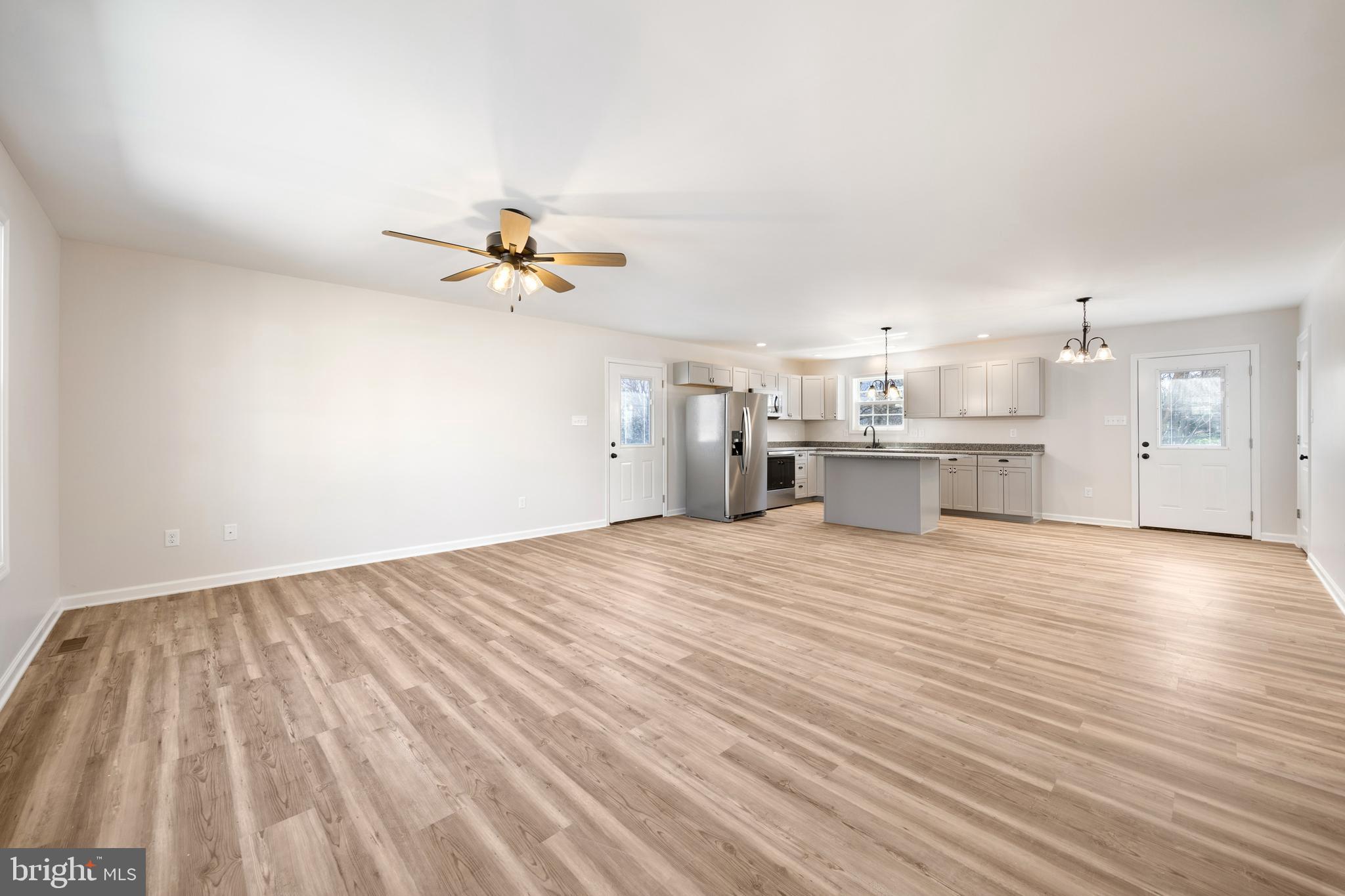 13518 Senedo Road Mount Jackson, VA 22842 - Photo 6 of 22 a view of an empty room with a kitchen