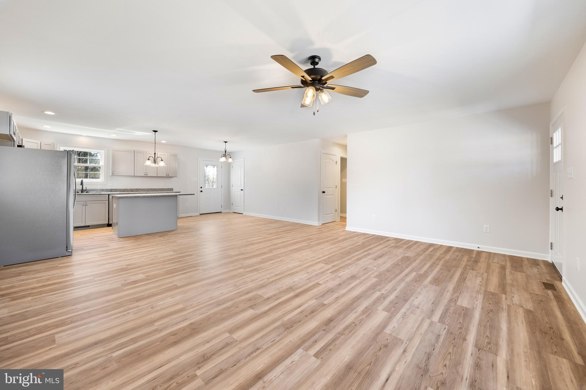 13518 Senedo Road Mount Jackson, VA 22842 - Photo 7 of 22 a view of a kitchen with wooden floor and a sink