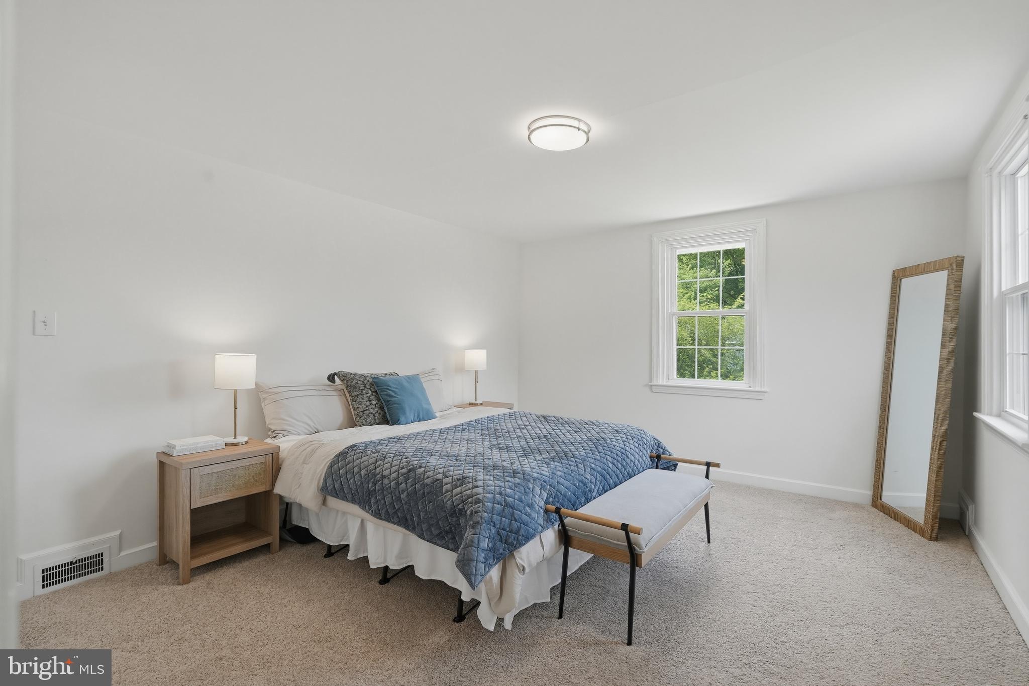 800 Pleasant Hill Road Wallingford, PA 19086 - Photo 20 of 34 a bedroom with a bed and a window