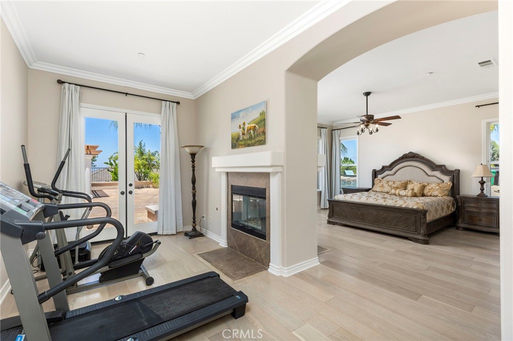 7907 Horizon View Drive Riverside, CA 92506 - Photo 18 of 58 Master bed room with double sided fireplace