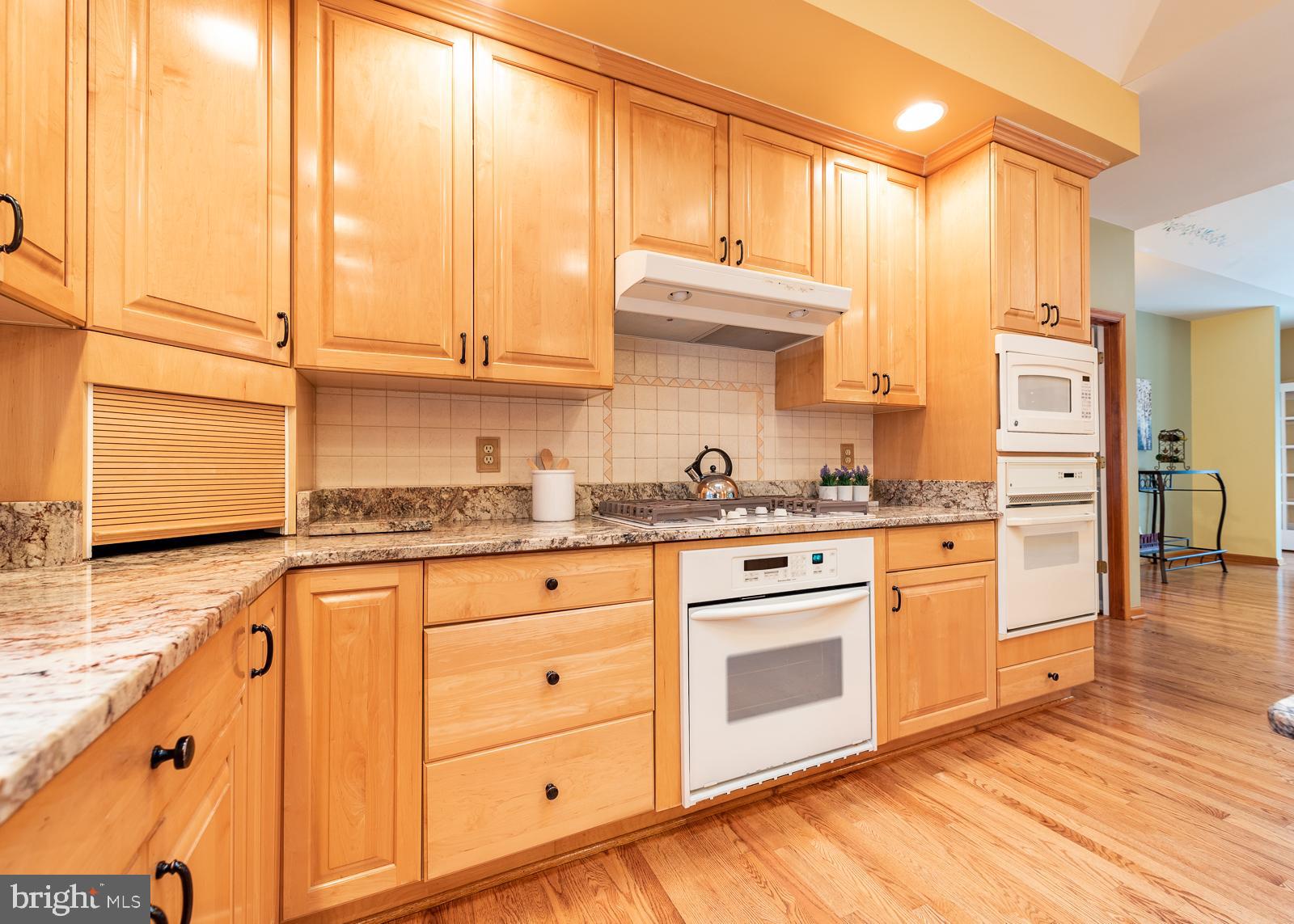 323 West Timonium Road Lutherville-Timonium, MD 21093 - Photo 6 of 38 Kitchen with Granite Counters and Double Ovens