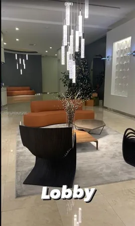 a room with table and chairs