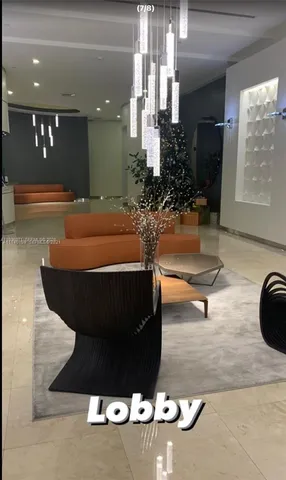 a room with table and chairs