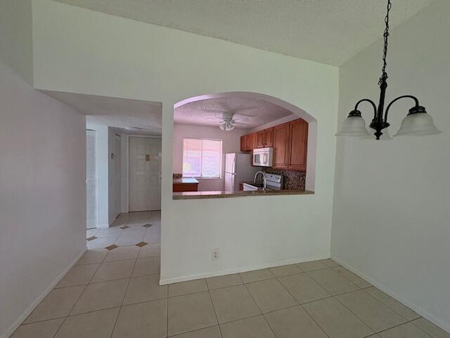 21938 Remsen Terrace, Unit 209 Boca Raton, FL 33433 - Photo 15 of 22 a view of kitchen with a sink