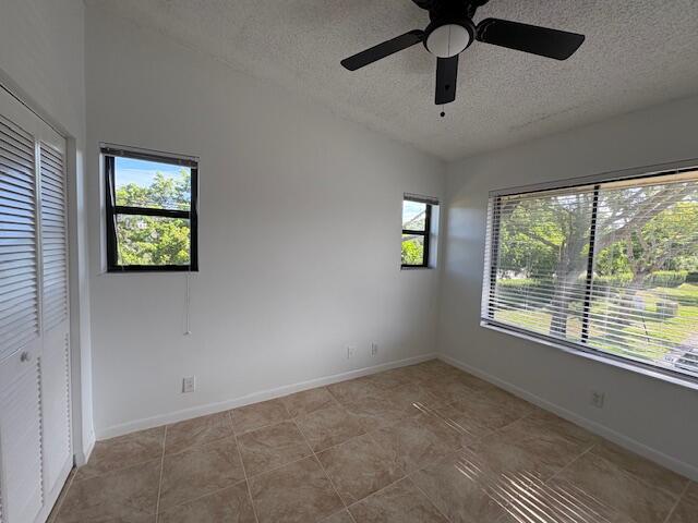 21938 Remsen Terrace, Unit 209 Boca Raton, FL 33433 - Photo 16 of 22 a view of an empty room with a window