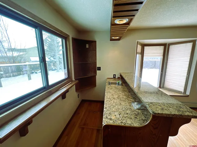 a view of a porch with furniture