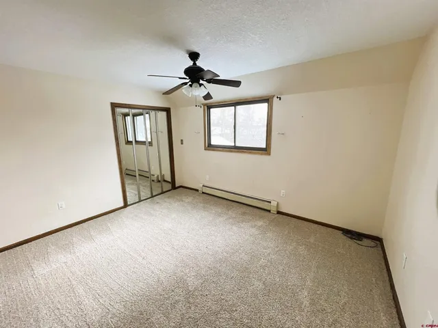 a bathroom with a tub and a sink