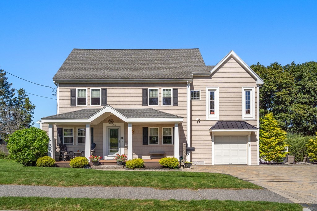 105 Brewster Road Waltham, MA 02451 - Photo 1 of 32 a front view of house with yard