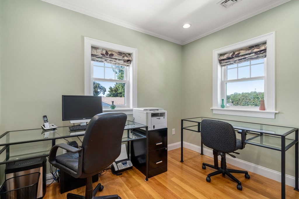 105 Brewster Road Waltham, MA 02451 - Photo 16 of 32 a view of a workspace with furniture and a window