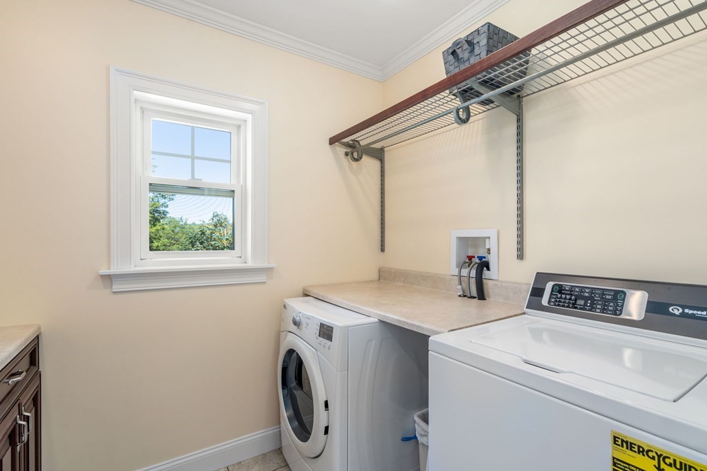 105 Brewster Road Waltham, MA 02451 - Photo 20 of 32 a utility room with dryer and washer