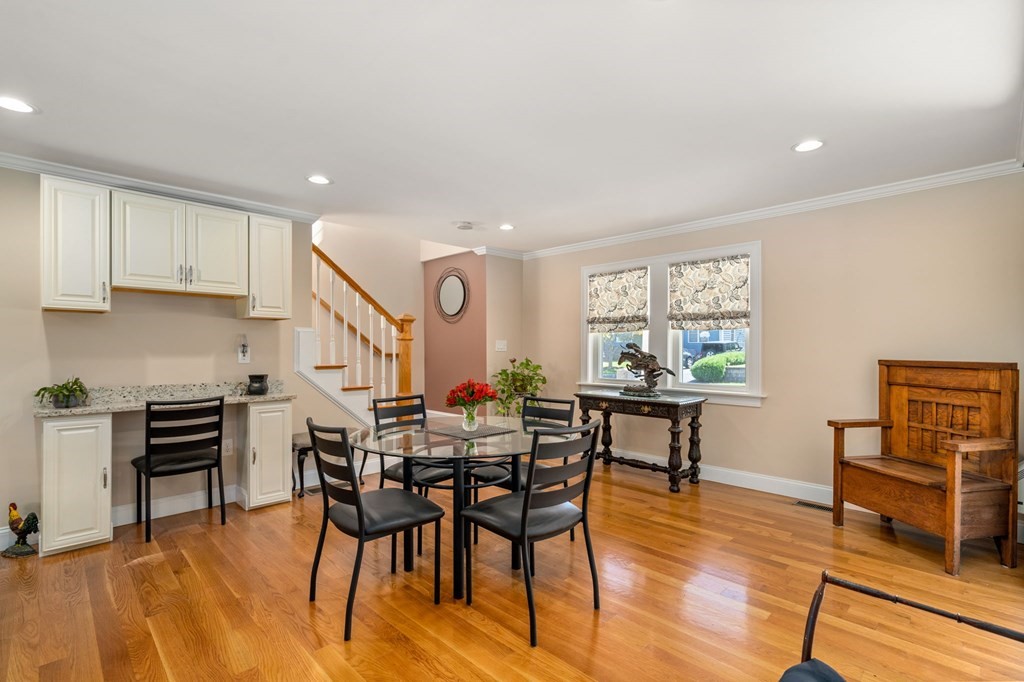 105 Brewster Road Waltham, MA 02451 - Photo 4 of 32 a view of a dining room with furniture window and wooden floor