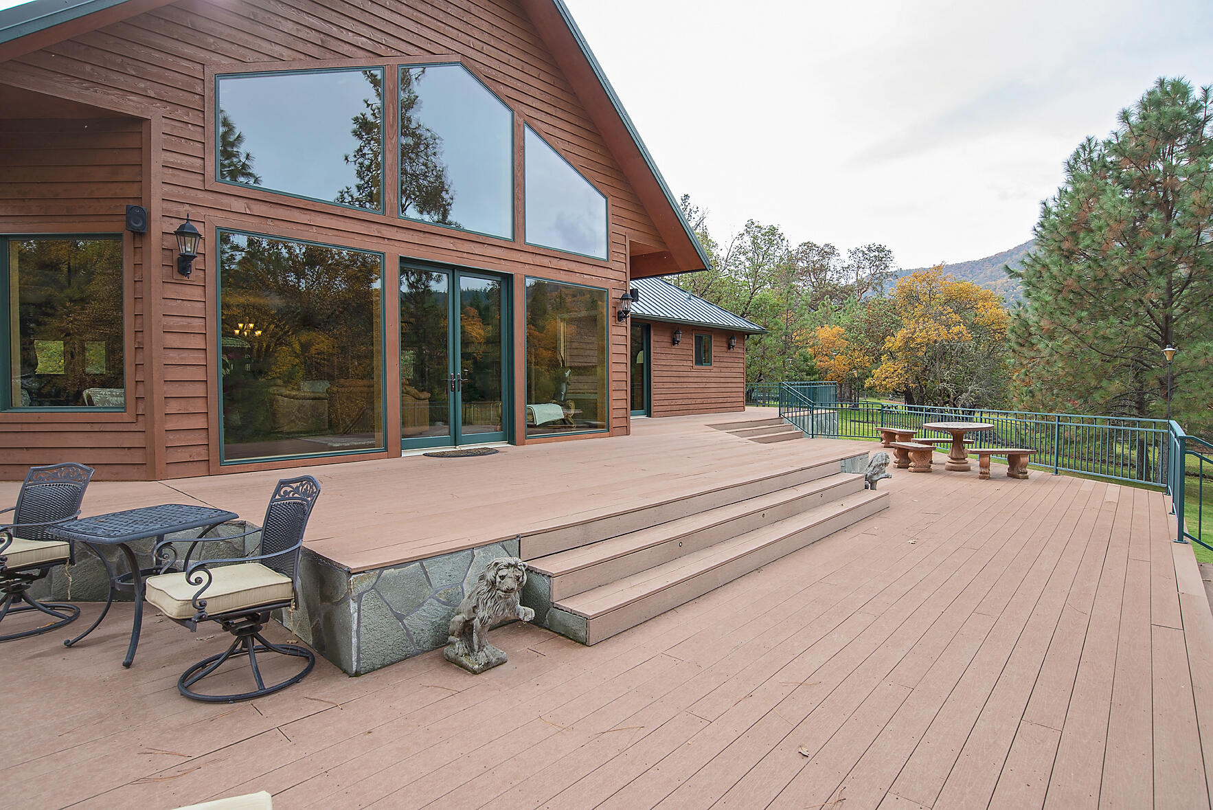 1665 Upper River Road Gold Hill, OR 97525 - Photo 29 of 48 a swimming pool with outdoor seating and yard