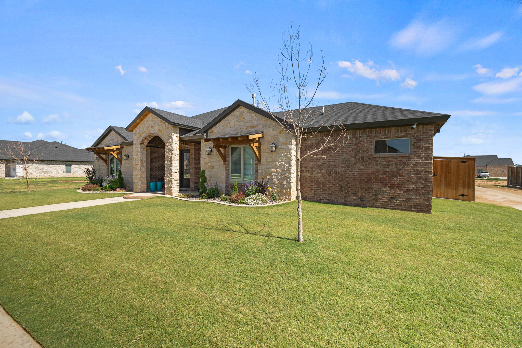 3416 141st Street Lubbock, TX 79423 - Photo 32 of 32 a front view of house with yard and porch