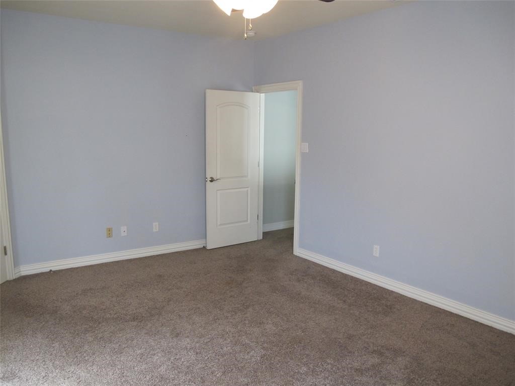 6715 Windrift Way, Unit 15 Austin, TX 78745 - Photo 22 of 37 a view of an empty room and closet area
