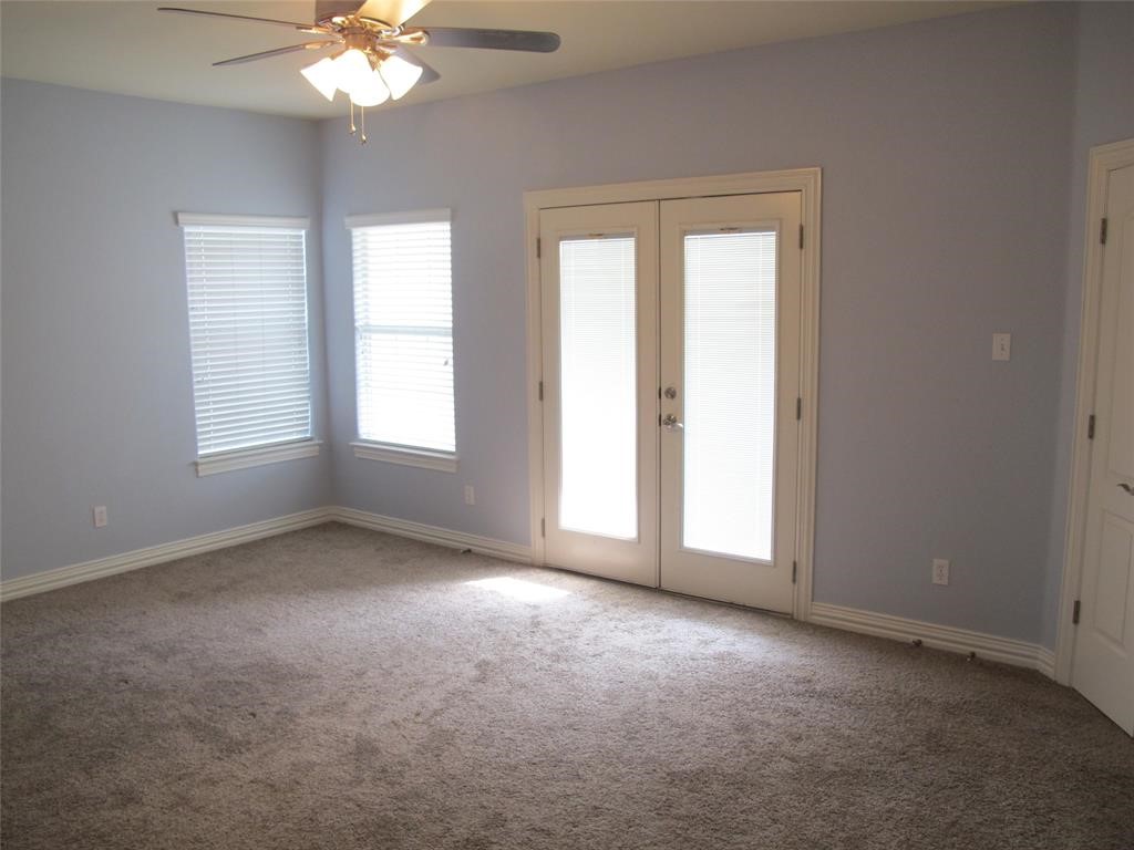 6715 Windrift Way, Unit 15 Austin, TX 78745 - Photo 23 of 37 an empty room that has a window