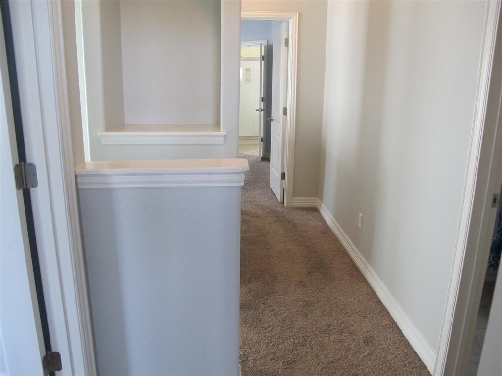 6715 Windrift Way, Unit 15 Austin, TX 78745 - Photo 29 of 37 a bathroom with a bathtub and a window