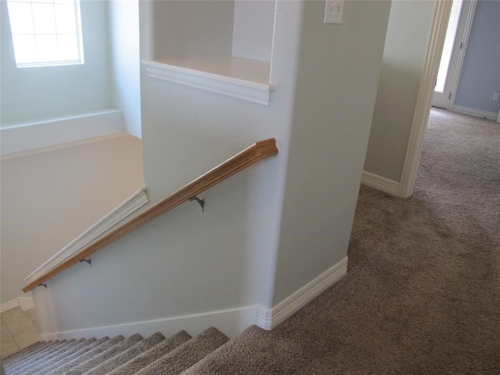 6715 Windrift Way, Unit 15 Austin, TX 78745 - Photo 33 of 37 a view of hallway with window