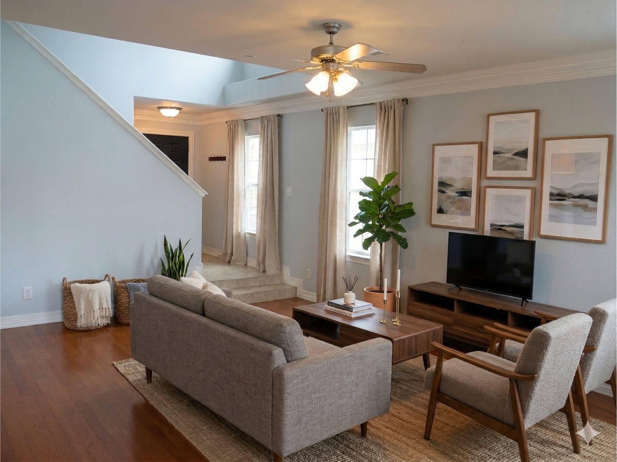 6715 Windrift Way, Unit 15 Austin, TX 78745 - Photo 5 of 37 a living room with furniture and a flat screen tv