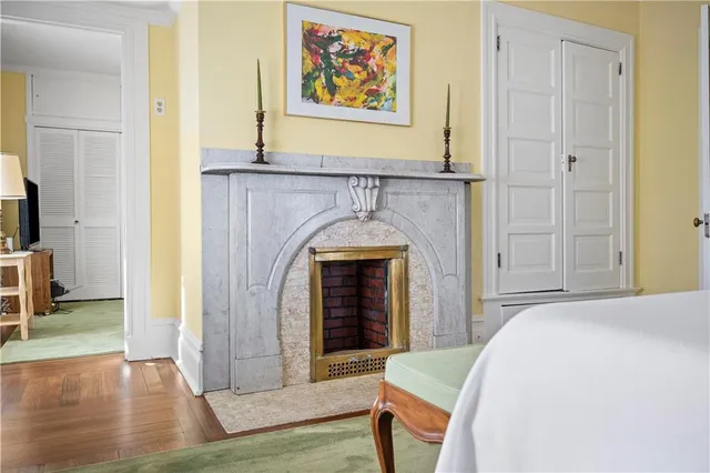 a living room with furniture a window and a table