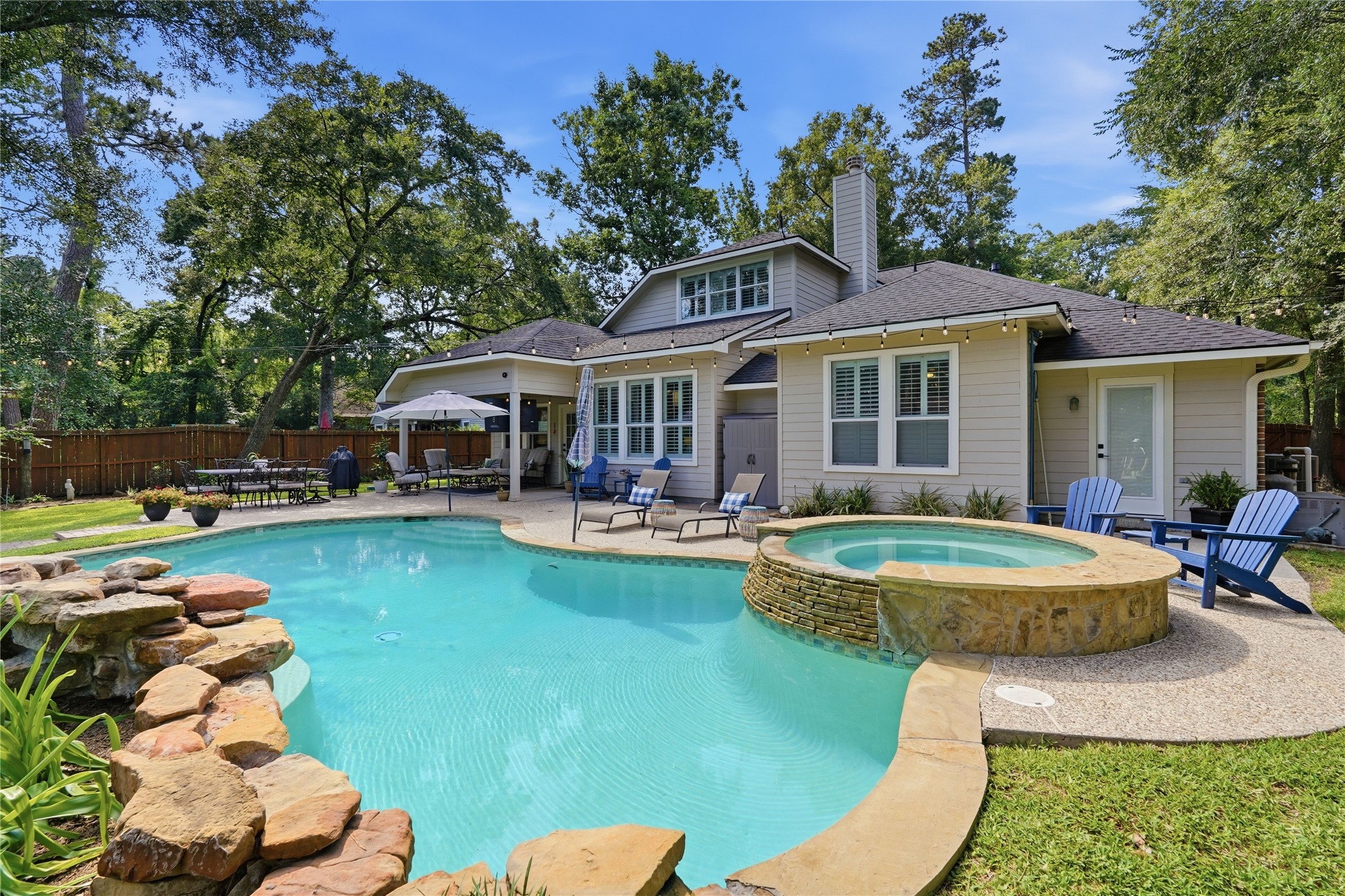 2408 Hollowbrook Lane Conroe, TX 77384 - Photo 37 of 49 Large pool and spa to enjoy with family and friends.