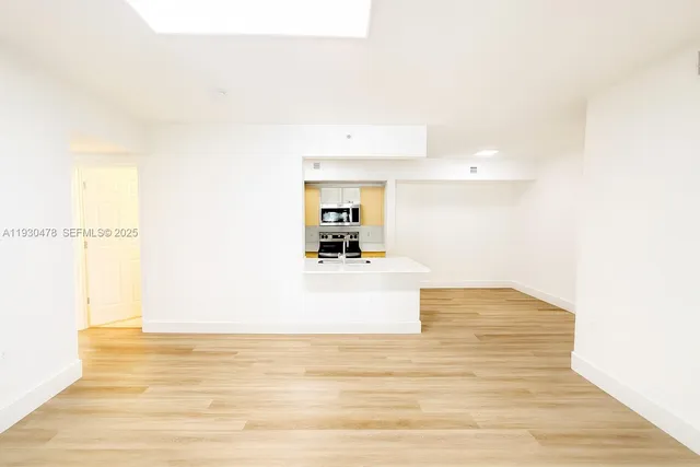 a view of a living room with a sink