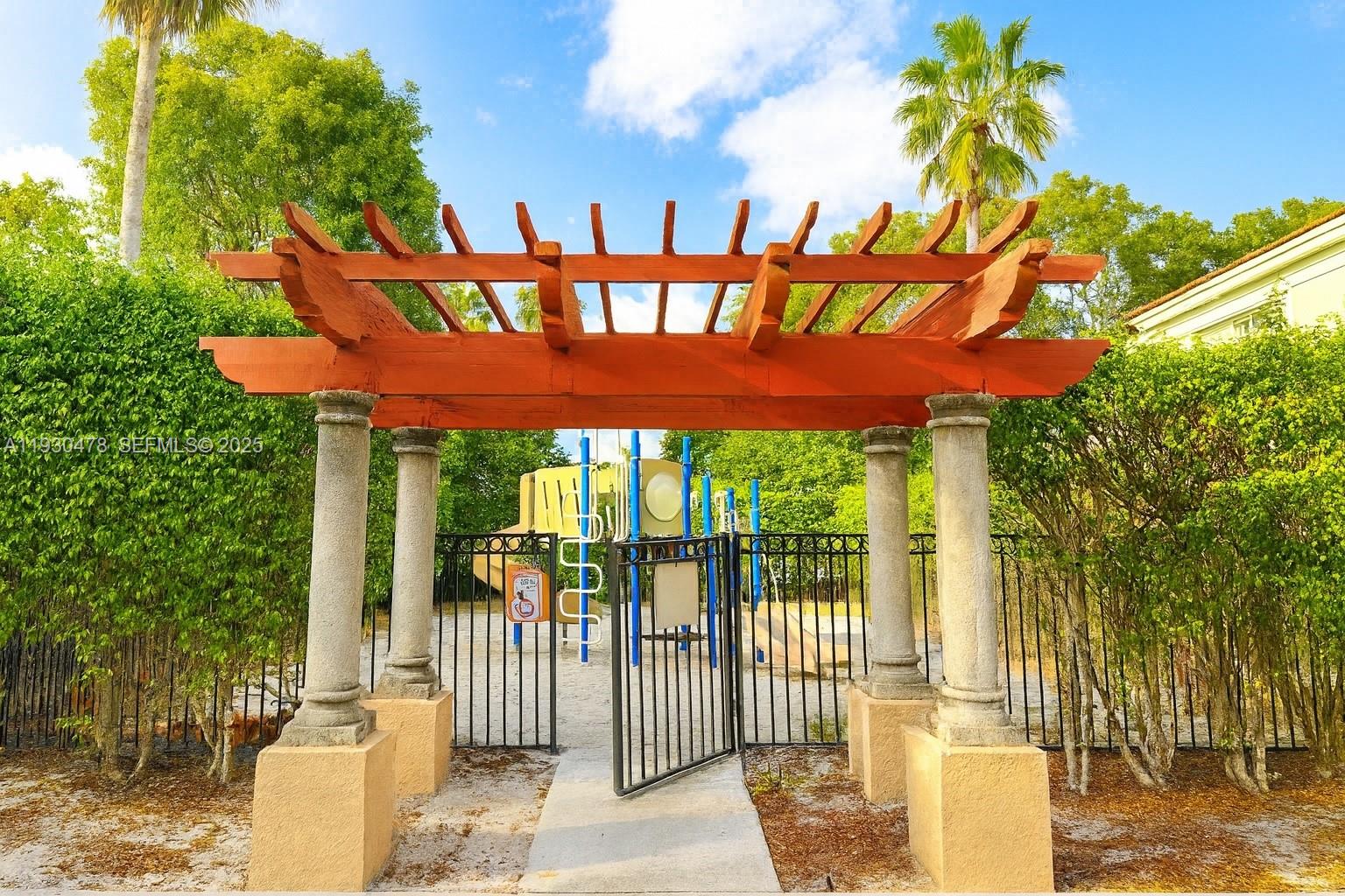 2564 Centergate Drive, Unit 208 Miramar, FL 33025 - Photo 25 of 31 a view of a porch with furniture and floor to ceiling window